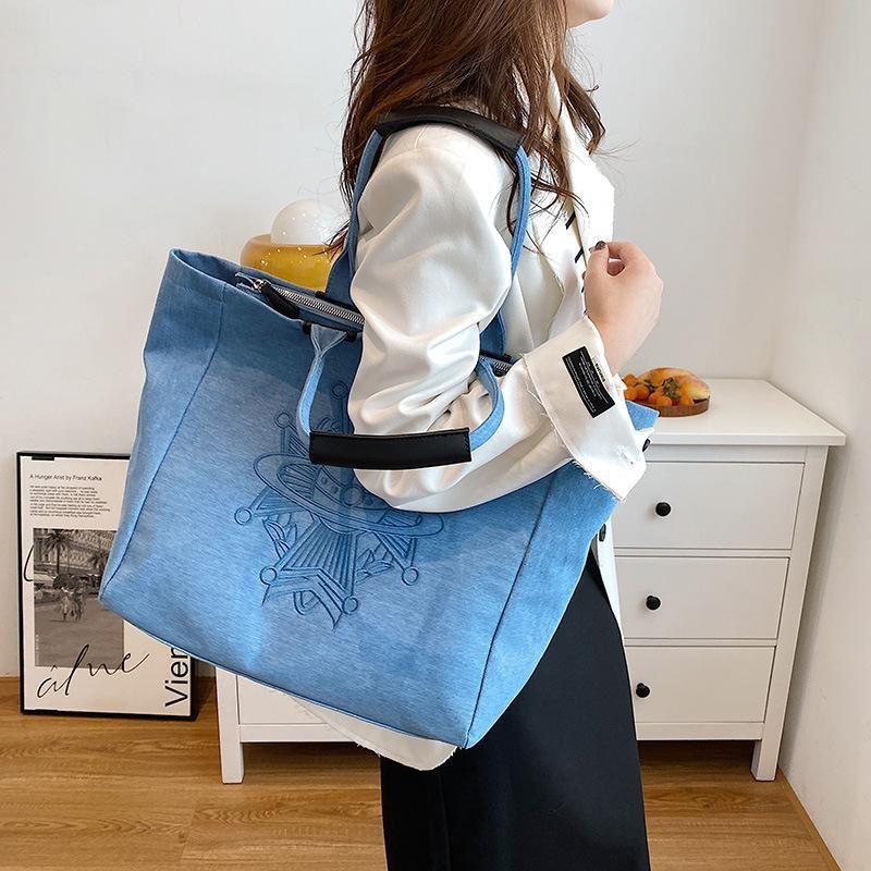 $188/1。Vivienne Westwood復古牛仔布袋