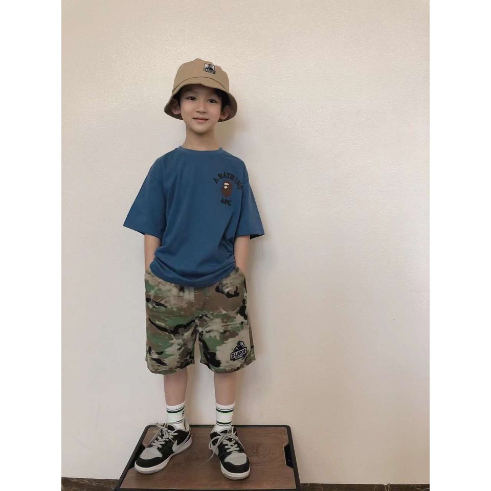 $95件。2件起$85件日系男童迷彩短褲