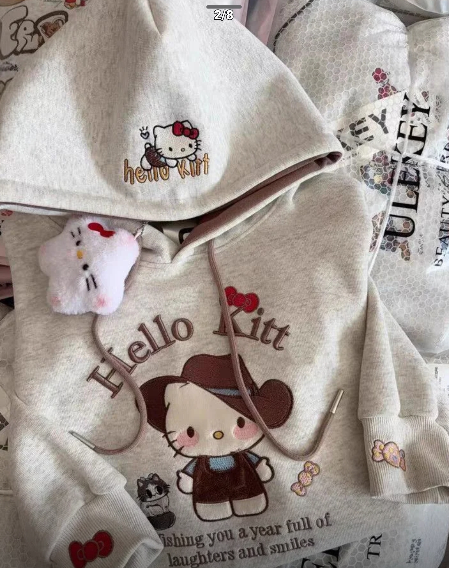 $68件。2件起$60件。🤎🐱Hello Kitty 牛仔风帽T