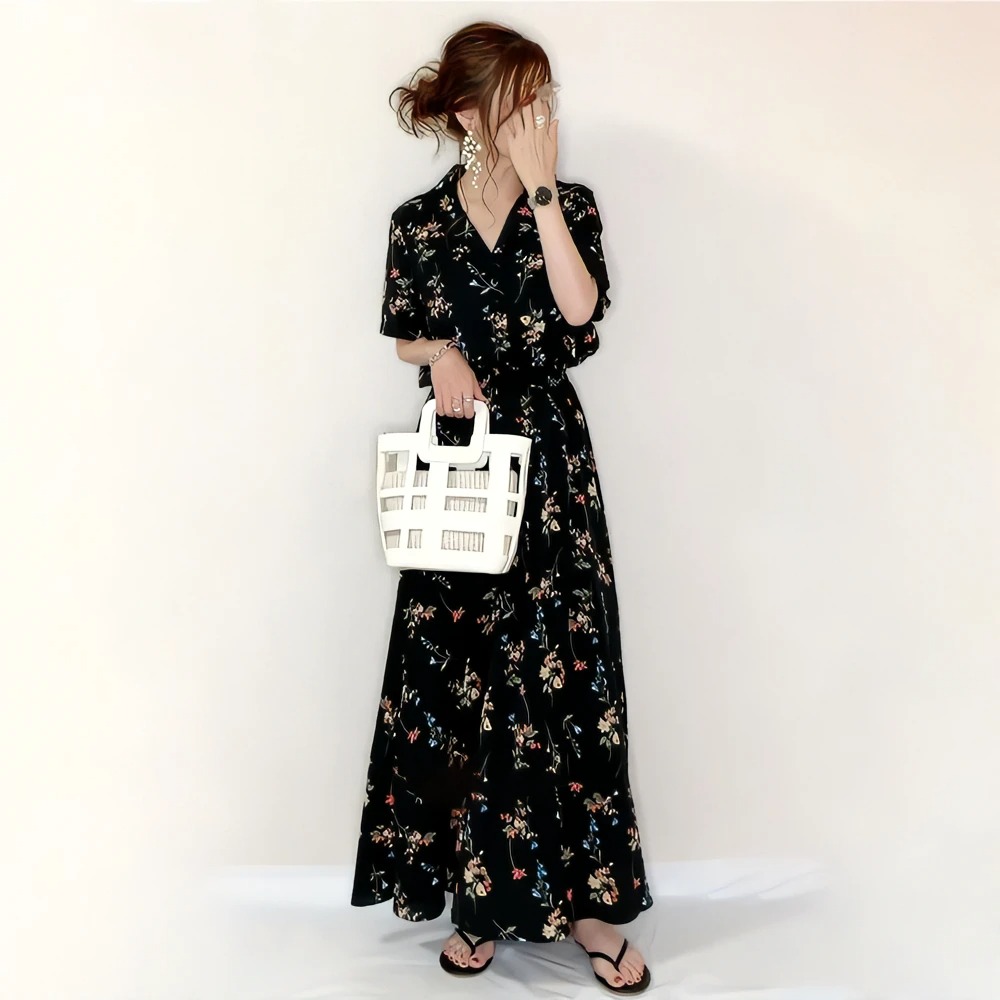 $98件。日系2023新款夏季黑色碎花V領短袖連身裙。-